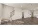 Living room with hardwood floors and staircase leading to upper level at 1069 Blue Juniper Cir, Loganville, GA 30052
