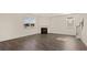 Bright living room with hardwood floors and a cozy fireplace at 1069 Blue Juniper Cir, Loganville, GA 30052