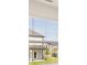 The window offers bright, natural light and a view of other homes and green space at 1069 Blue Juniper Cir, Loganville, GA 30052