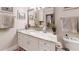 Bathroom featuring white cabinetry, marble countertop, and modern fixtures at 300 Johnson Ferry Ne Rd # A403, Atlanta, GA 30328