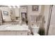Elegant bathroom with marble countertops, neutral decor, and ample lighting at 300 Johnson Ferry Ne Rd # A403, Atlanta, GA 30328