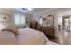 Bedroom with plush bed, plantation shutters, and wood floors at 300 Johnson Ferry Ne Rd # A403, Atlanta, GA 30328