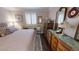 Serene bedroom with plantation shutters, antique dresser and a luxurious rug at 300 Johnson Ferry Ne Rd # A403, Atlanta, GA 30328