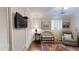 Comfortable bedroom with plantation shutters and a cozy reading nook by the window at 300 Johnson Ferry Ne Rd # A403, Atlanta, GA 30328