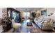 Comfortable living room features a plush sofa, accent chairs, and balcony access at 300 Johnson Ferry Ne Rd # A403, Atlanta, GA 30328