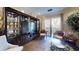 Comfortable living room features a plush sofa, accent chairs, and balcony access at 300 Johnson Ferry Ne Rd # A403, Atlanta, GA 30328