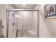 Tiled shower area, complete with glass door, seat, and showerhead at 300 Johnson Ferry Ne Rd # A403, Atlanta, GA 30328