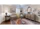 Sitting area features an accent rug, bench, and accent chair at 300 Johnson Ferry Ne Rd # A403, Atlanta, GA 30328