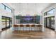 Stylish lounge with long island bar seating, modern lighting, and convenient exit doors at 507 Zeal Street # 334, Atlanta, GA 30315