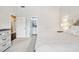 Bright bedroom with neutral carpet, and view of the bathroom at 8760 Colonial Pl, Duluth, GA 30097