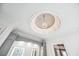 Intricate ceiling detail showcasing a decorative ceiling medallion and a elegant light fixture at 8760 Colonial Pl, Duluth, GA 30097