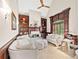Cozy living room with fireplace, built-in bookshelves, and comfortable seating at 8760 Colonial Pl, Duluth, GA 30097