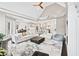 Expansive living room with vaulted ceilings, seamless flow into a gourmet kitchen, and ample space for comfortable gatherings at 8760 Colonial Pl, Duluth, GA 30097