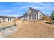 Expansive backyard with an enclosed porch and a lawn for recreational activities at 1109 Alaska St, Hampton, GA 30228