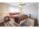 Cozy bedroom featuring a ceiling fan, neutral colors, and lots of natural light at 1109 Alaska St, Hampton, GA 30228