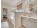 Elegant main bathroom featuring a soaking tub, dual vanity, and a separate shower at 1109 Alaska St, Hampton, GA 30228