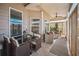 Charming patio offering outdoor dining and lounge seating and ample natural light at 1109 Alaska St, Hampton, GA 30228