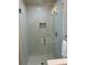 Modern bathroom featuring a glass shower with white subway tile and a built-in niche at 816 Berne St # 4, Atlanta, GA 30316