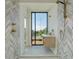 Modern bathroom featuring chevron pattern tiles, sleek fixtures, and a scenic view at 816 Berne St # 4, Atlanta, GA 30316