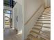 Bright and airy entryway featuring light hardwood floors and minimalist staircase at 816 Berne St # 4, Atlanta, GA 30316