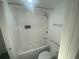 This bathroom features a tub with white subway tile and a shower head at 145 Amherst Nw Pl, Atlanta, GA 30327