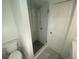 A modern glass shower enclosure features stylish tile and modern fixtures at 145 Amherst Nw Pl, Atlanta, GA 30327