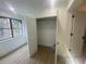 This closet features natural light through the window and a clothing rod for storage at 145 Amherst Nw Pl, Atlanta, GA 30327