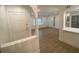 Open-concept living room showcasing new flooring and fresh, neutral paint at 145 Amherst Nw Pl, Atlanta, GA 30327