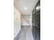 Bright foyer with gray floors and view of staircase to the second level at 3865 Whitney Pl, Duluth, GA 30096