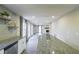 Bright kitchen featuring white cabinets, granite countertops, an island and modern stainless steel appliances at 3865 Whitney Pl, Duluth, GA 30096
