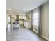 Gourmet kitchen with a center island, modern appliances, and ample cabinet space at 3865 Whitney Pl, Duluth, GA 30096