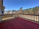 Relax and unwind on this spacious outdoor back deck with lovely treeline views at 5546 Wellborn Creek Dr, Lithonia, GA 30058