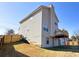 View of the backyard featuring a deck and fenced in yard at 5546 Wellborn Creek Dr, Lithonia, GA 30058
