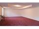 Finished basement with drop ceiling and white walls at 5546 Wellborn Creek Dr, Lithonia, GA 30058