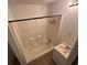 Bathroom with tub and shower combo, and a modern vanity at 5546 Wellborn Creek Dr, Lithonia, GA 30058