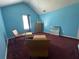 Bedroom with vaulted ceilings, carpeted floors, chest of drawers and accent furniture at 5546 Wellborn Creek Dr, Lithonia, GA 30058