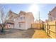 Exterior shot of the home featuring the backyard, siding, deck, and fence at 5546 Wellborn Creek Dr, Lithonia, GA 30058