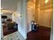 View of the front door, hallway, and living room at 5546 Wellborn Creek Dr, Lithonia, GA 30058