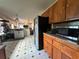 Spacious kitchen with tile floors and stainless steel appliances at 5546 Wellborn Creek Dr, Lithonia, GA 30058