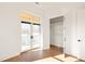 Bedroom featuring a balcony with hardwood flooring, and natural light at 1235 Lupo Loop, Palmetto, GA 30268