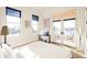 Bright bedroom features a large windows and door leading to a private balcony at 1235 Lupo Loop, Palmetto, GA 30268