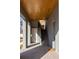 Modern entryway features a wood plank ceiling with recessed lights leading to an upper level at 1235 Lupo Loop, Palmetto, GA 30268