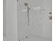Elegant walk-in shower with marble tile, glass enclosure, and gold fixtures at 343 Sugarview Rd, Sugar Hill, GA 30518