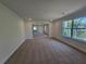 A roomy carpeted bedroom showcasing recessed lighting, and multiple windows offering great natural light at 3677 Thornhill Ct, Douglasville, GA 30135