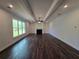 Large living room with hardwood floors, fireplace, and natural light at 3677 Thornhill Ct, Douglasville, GA 30135