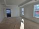 Bright main bedroom with an en-suite entry, recessed ceilings, and large windows at 3677 Thornhill Ct, Douglasville, GA 30135