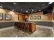 Club room features a bar, cabinets, a microwave, mini refrigerator and seating for residents at 1280 W Peachtree Nw St # 3414, Atlanta, GA 30309