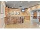 Lounge features a bar with seating, a television and marble floors at 1280 W Peachtree Nw St # 3414, Atlanta, GA 30309