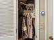 Efficiently organized closet space with hanging storage and neat shelving for optimal storage solutions at 1280 W Peachtree Nw St # 3414, Atlanta, GA 30309