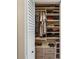 Organized closet with shelving, hanging rods, and drawer storage for efficient wardrobe management at 1280 W Peachtree Nw St # 3414, Atlanta, GA 30309